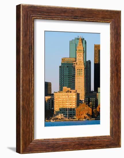 The Customs House Clock Tower and Boston skyline at sunrise, as seen from South Boston, Massachu...-null-Framed Photographic Print