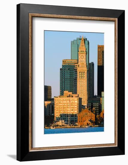 The Customs House Clock Tower and Boston skyline at sunrise, as seen from South Boston, Massachu...-null-Framed Photographic Print