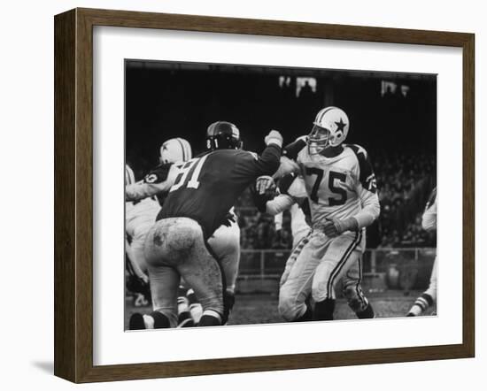 The Dallas Cowboys in Light Jerseys, Playing Against the New York Giants, in Dark Jerseys-Ralph Morse-Framed Premium Photographic Print