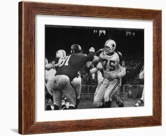 The Dallas Cowboys in Light Jerseys, Playing Against the New York Giants, in Dark Jerseys-Ralph Morse-Framed Premium Photographic Print