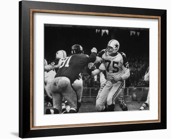 The Dallas Cowboys in Light Jerseys, Playing Against the New York Giants, in Dark Jerseys-Ralph Morse-Framed Premium Photographic Print