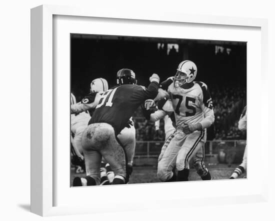 The Dallas Cowboys in Light Jerseys, Playing Against the New York Giants, in Dark Jerseys-Ralph Morse-Framed Premium Photographic Print