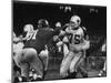 The Dallas Cowboys in Light Jerseys, Playing Against the New York Giants, in Dark Jerseys-Ralph Morse-Mounted Premium Photographic Print