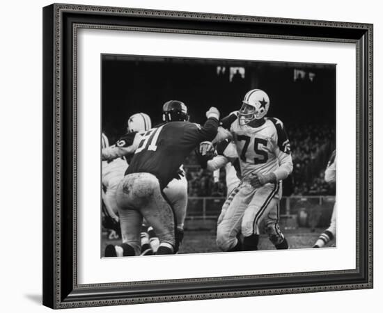 The Dallas Cowboys in Light Jerseys, Playing Against the New York Giants, in Dark Jerseys-Ralph Morse-Framed Premium Photographic Print