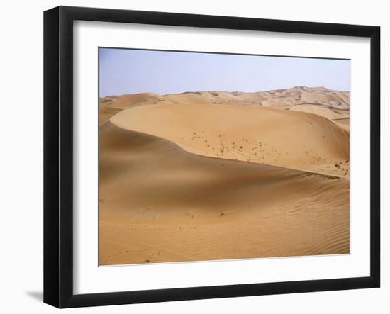 The desert near al-'Ain - the knife blade edges of the dune crests are formed by the wind-Werner Forman-Framed Giclee Print