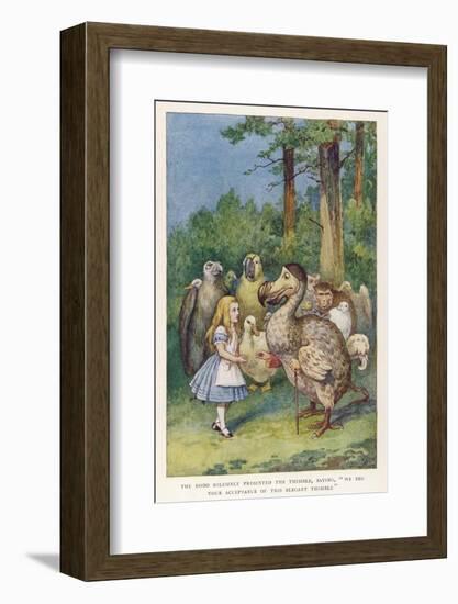 The Dodo Solemnly Presented the Thimble Saying "We Beg Your Acceptance of This Elegant Thimble"-John Tenniel-Framed Photographic Print