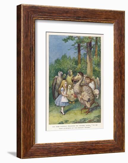 The Dodo Solemnly Presented the Thimble Saying "We Beg Your Acceptance of This Elegant Thimble"-John Tenniel-Framed Photographic Print