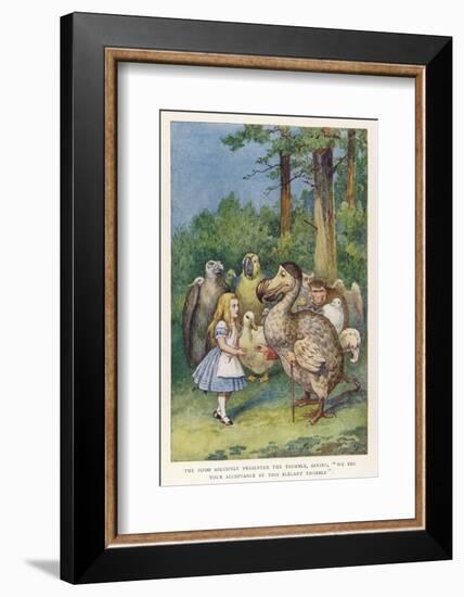 The Dodo Solemnly Presented the Thimble Saying "We Beg Your Acceptance of This Elegant Thimble"-John Tenniel-Framed Photographic Print