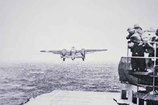 The Doolittle Raid On Tokyo 18th April 1942 One Of 16 B 25 Bombers Leaves The Deck Of Uss Hornet Photographic Print American Photographer Art Com