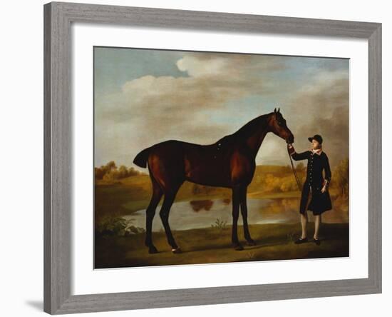 The Duke of Marlborough's (?) Bay Hunter, with a Groom in Livery in a Lake Landscape-George Stubbs-Framed Giclee Print