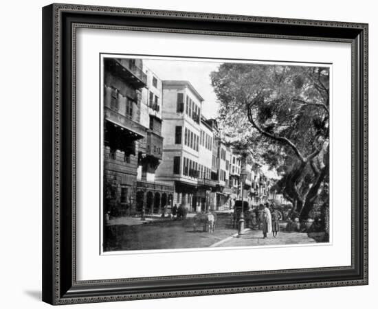 The Ezbekiyeh and Street Scene, Cairo, Egypt, Late 19th Century-John L Stoddard-Framed Giclee Print