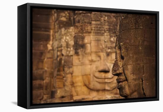 The faces on the Bayon temple at Angkor, UNESCO World Heritage Site, Siem Reap, Cambodia, Indochina-Alex Treadway-Framed Premier Image Canvas