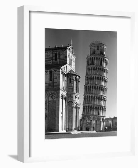 The Famed Leaning Tower of Pisa Standing Beside the Baptistry of the Cathedral-Margaret Bourke-White-Framed Photographic Print