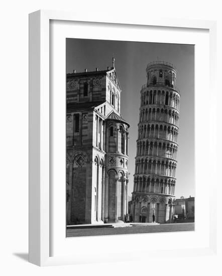 The Famed Leaning Tower of Pisa Standing Beside the Baptistry of the Cathedral-Margaret Bourke-White-Framed Photographic Print