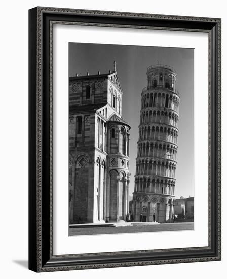 The Famed Leaning Tower of Pisa Standing Beside the Baptistry of the Cathedral-Margaret Bourke-White-Framed Photographic Print