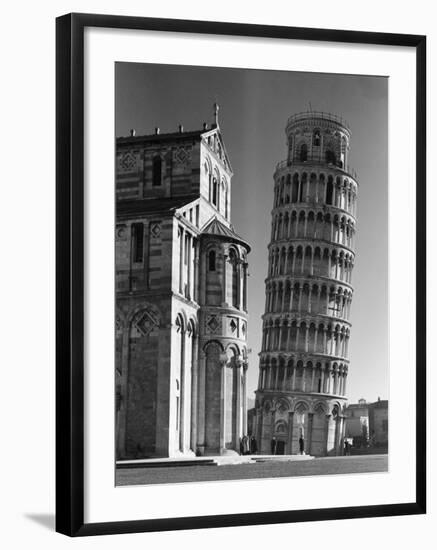 The Famed Leaning Tower of Pisa Standing Beside the Baptistry of the Cathedral-Margaret Bourke-White-Framed Photographic Print