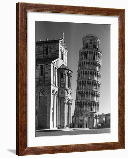 The Famed Leaning Tower of Pisa Standing Beside the Baptistry of the Cathedral-Margaret Bourke-White-Framed Photographic Print