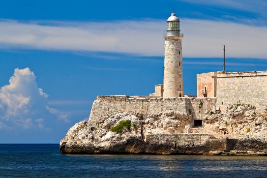 El Morro spanish fortress with lighthouse, cannons and cuban flag in th  foreground, with sea in the background, Havana, Cuba 18835008 Stock Photo  at Vecteezy