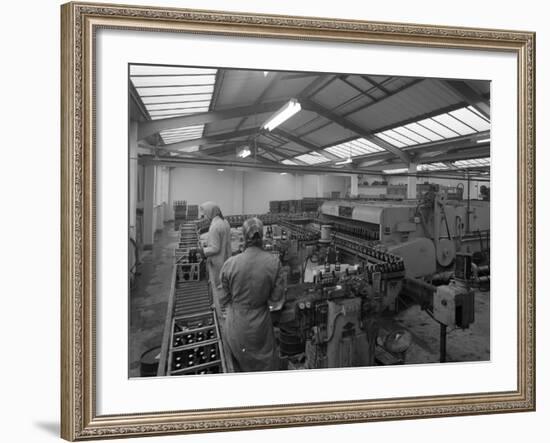 The Final Process of Bottling Beer, Ward and Sons Bottling Plant, Swinton, South Yorkshire, 1960-Michael Walters-Framed Photographic Print