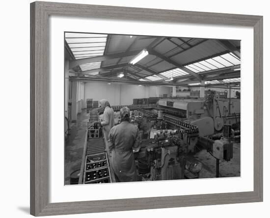 The Final Process of Bottling Beer, Ward and Sons Bottling Plant, Swinton, South Yorkshire, 1960-Michael Walters-Framed Photographic Print