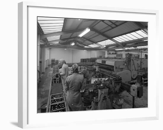 The Final Process of Bottling Beer, Ward and Sons Bottling Plant, Swinton, South Yorkshire, 1960-Michael Walters-Framed Photographic Print