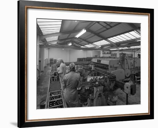 The Final Process of Bottling Beer, Ward and Sons Bottling Plant, Swinton, South Yorkshire, 1960-Michael Walters-Framed Photographic Print