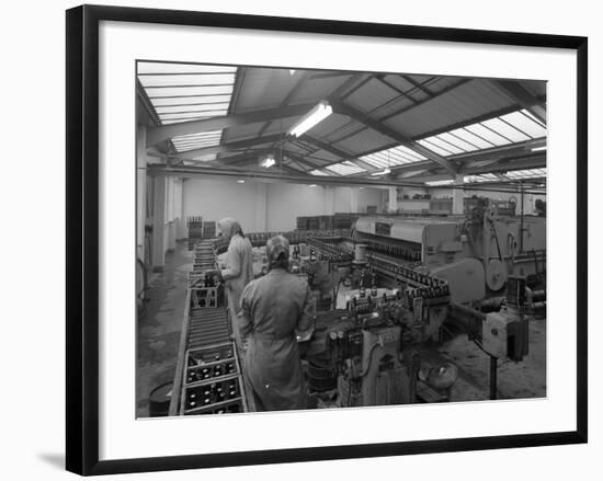 The Final Process of Bottling Beer, Ward and Sons Bottling Plant, Swinton, South Yorkshire, 1960-Michael Walters-Framed Photographic Print