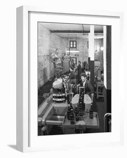 The Final Stages of Bottling Whisky at Wiley and Co, Sheffield, South Yorkshire, 1960-Michael Walters-Framed Photographic Print