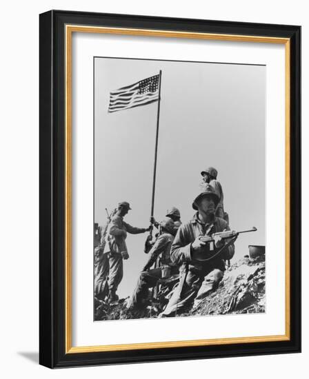 The First Flag Raising on Iwo Jima's Mount Suribachi-null-Framed Photo