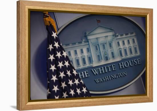 The Flag and Seal at a White House Press Briefing-Dennis Brack-Framed Premier Image Canvas