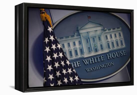 The Flag and Seal at a White House Press Briefing-Dennis Brack-Framed Premier Image Canvas