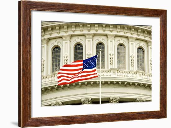 The Flag of the USA Flying in Front of the Capitol Building in Washington, Dc.-Gary Blakeley-Framed Photographic Print