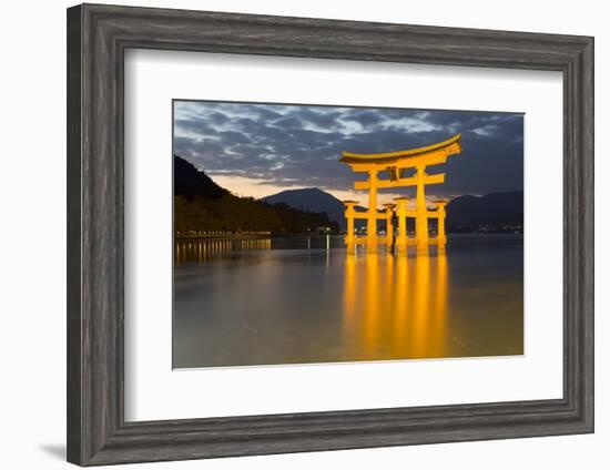 The Floating Miyajima Torii Gate of Itsukushima Shrine at Dusk-Stuart Black-Framed Photographic Print