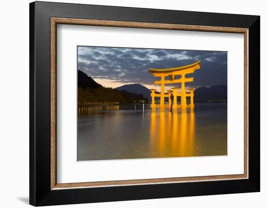 The Floating Miyajima Torii Gate of Itsukushima Shrine at Dusk-Stuart Black-Framed Photographic Print