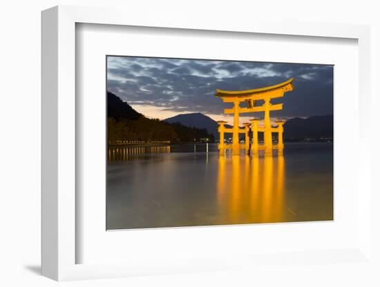 The Floating Miyajima Torii Gate of Itsukushima Shrine at Dusk-Stuart Black-Framed Photographic Print