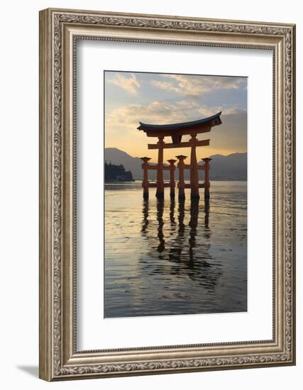 The Floating Miyajima Torii Gate of Itsukushima Shrine at Sunset-Stuart Black-Framed Photographic Print