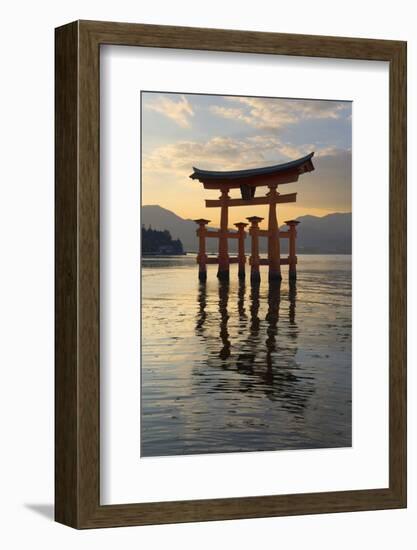 The Floating Miyajima Torii Gate of Itsukushima Shrine at Sunset-Stuart Black-Framed Photographic Print