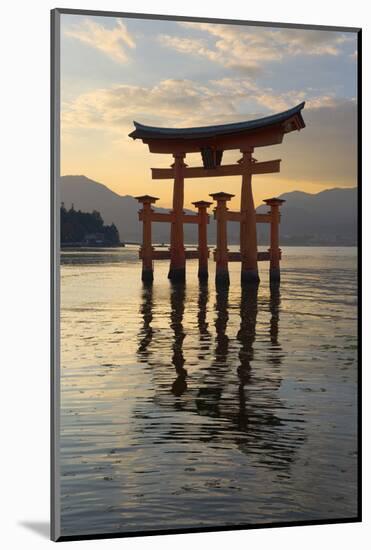 The Floating Miyajima Torii Gate of Itsukushima Shrine at Sunset-Stuart Black-Mounted Photographic Print