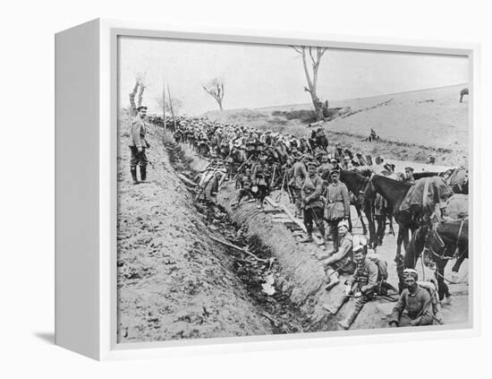 'The German advance through Galicia: A bivouac of troops by the roadside', 1915-Unknown-Framed Premier Image Canvas