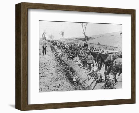 'The German advance through Galicia: A bivouac of troops by the roadside', 1915-Unknown-Framed Photographic Print