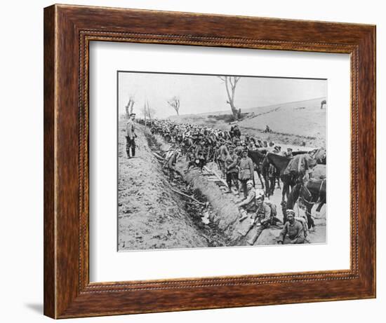 'The German advance through Galicia: A bivouac of troops by the roadside', 1915-Unknown-Framed Photographic Print