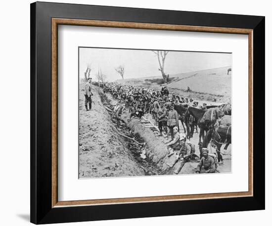 'The German advance through Galicia: A bivouac of troops by the roadside', 1915-Unknown-Framed Photographic Print