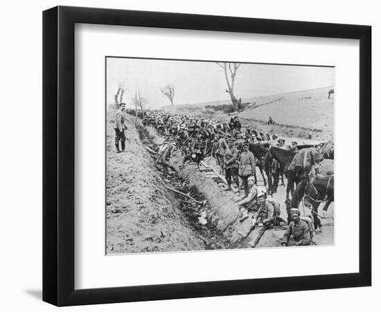 'The German advance through Galicia: A bivouac of troops by the roadside', 1915-Unknown-Framed Photographic Print