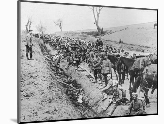 'The German advance through Galicia: A bivouac of troops by the roadside', 1915-Unknown-Mounted Photographic Print