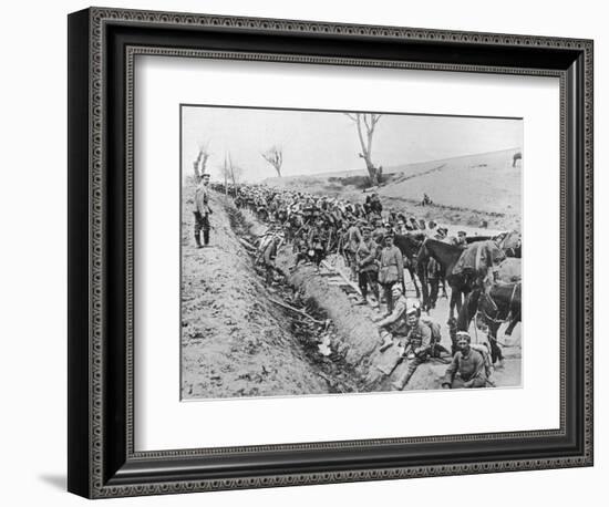 'The German advance through Galicia: A bivouac of troops by the roadside', 1915-Unknown-Framed Photographic Print