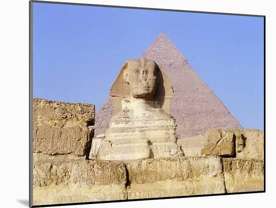 The Giza Sphinx with the pyramid of Khephren in the background-Werner Forman-Mounted Giclee Print