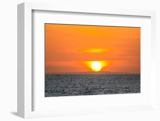 The golden setting sun reflects a gold glow on the beach at Pererenan Beach, Bali, Indonesia-Greg Johnston-Framed Photographic Print