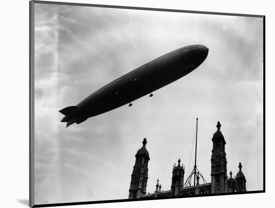 The Graf Zeppelin Airship in London-null-Mounted Photographic Print