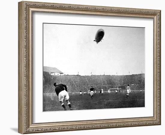 The 'Graf Zeppelin' over Wembley During the F.A. Cup Final-null-Framed Photographic Print