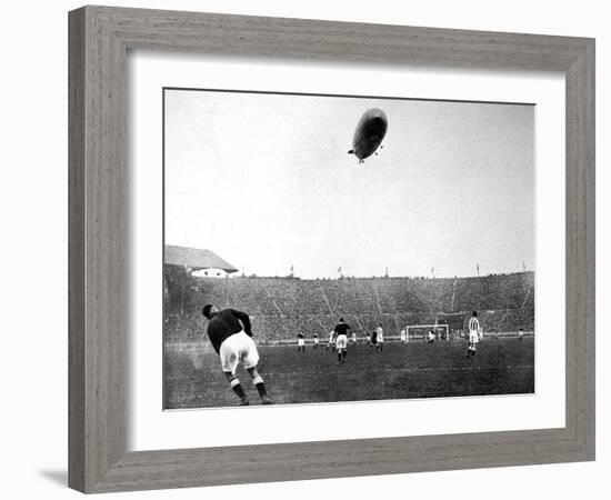 The 'Graf Zeppelin' over Wembley During the F.A. Cup Final-null-Framed Photographic Print